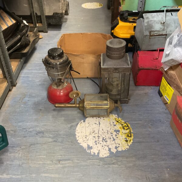 Group of vintage railway lanterns, antique railroad signalling.