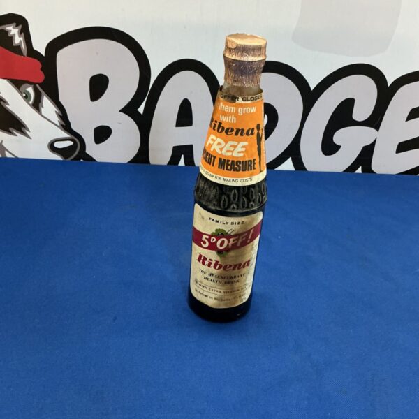 Vintage Ribena bottle with colourful label, collectible drinkware.
