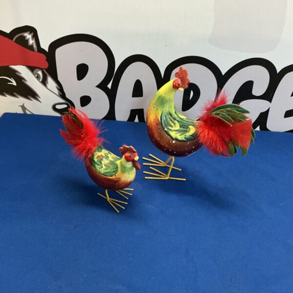 Colourful vintage rocking rooster figurine for farmhouse decor.