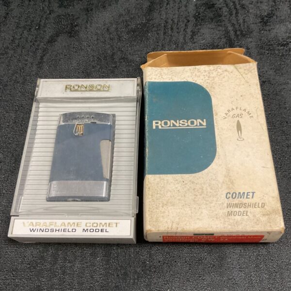 Vintage Ronson Comet Varaflame lighter in its original box.