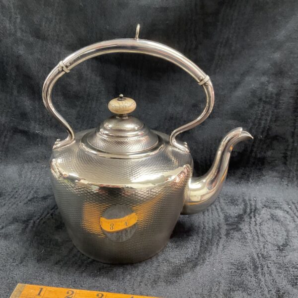 Vintage silver plate spirit kettle with Victorian detailing.
