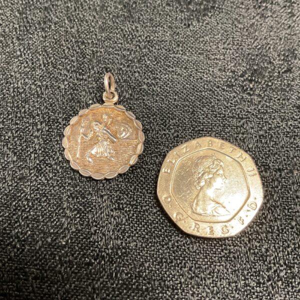 Vintage St Christopher pendant medallion with Elizabeth II coin.