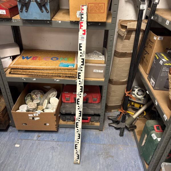 Vintage surveyors height measure with telescopic extension.