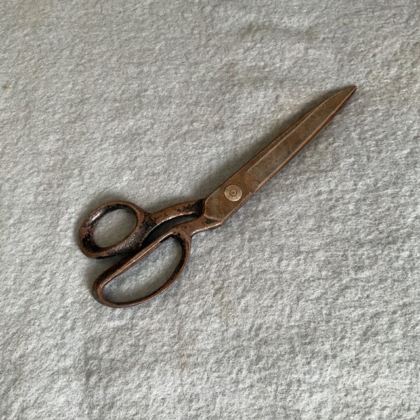 Large vintage iron tailors scissors for sewing and dressmaking.