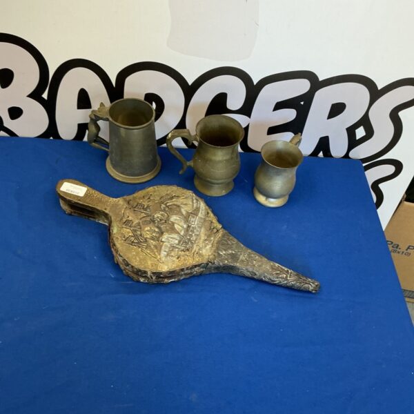 Vintage tankards and bellows lot, antique pubware and hearth tools.