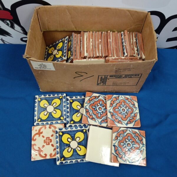 Vintage terracotta tiles with a vibrant floral pattern.