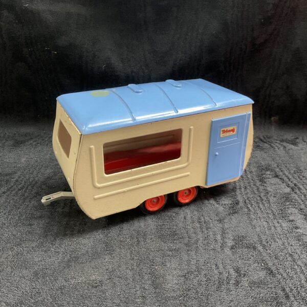 Vintage Triang metal toy caravan, front view.