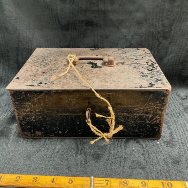 Vintage wartime cash box with triple locks and handle.