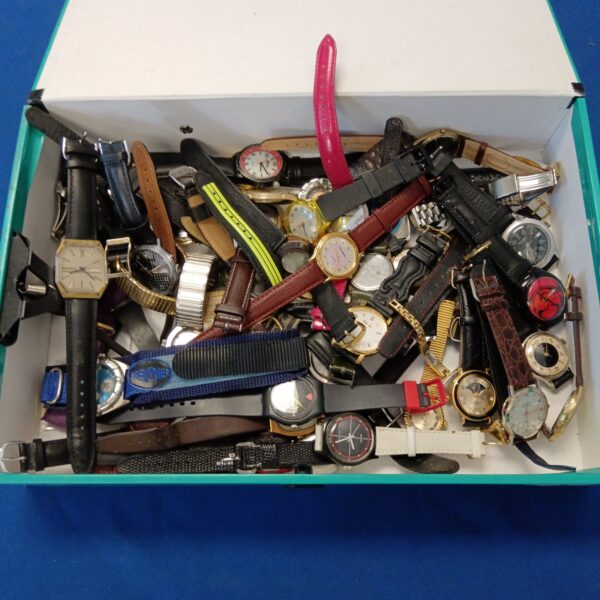 Assorted vintage watches including Avia and Tikkers in a collection.