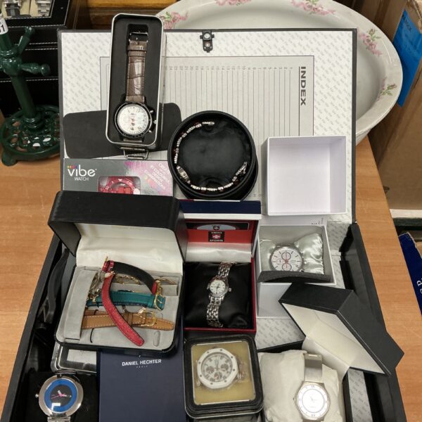 Vintage watch lot including a Jeep branded wristwatch.