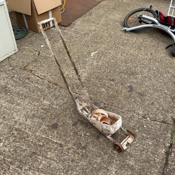 Vintage white line marker for sports field marking.