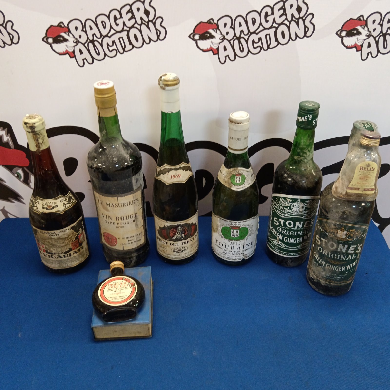 Vintage wine collection including Stones Ginger Wine and Pinot del Trentino.