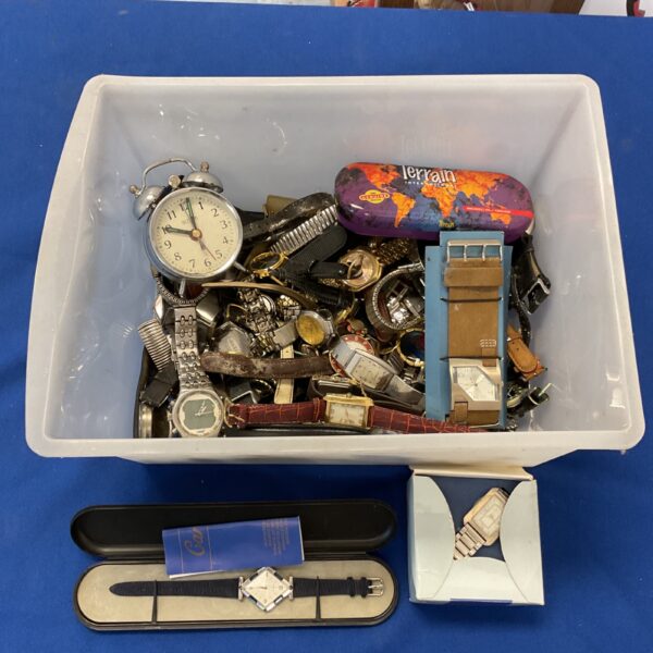 Vintage wrist watch lot with Le Chat and Pod brands visible.