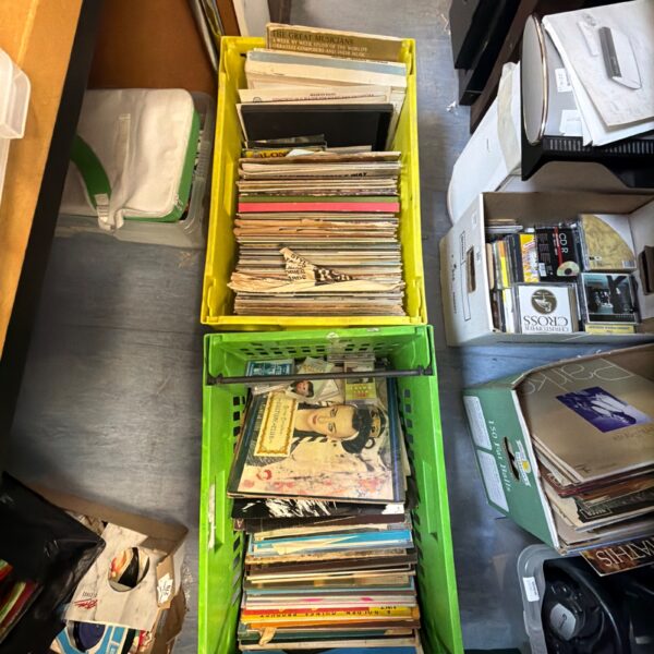 Large lot of mixed vinyl records in plastic crates.