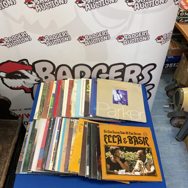 Mixed lot of twelve-inch vinyl records for collectors.