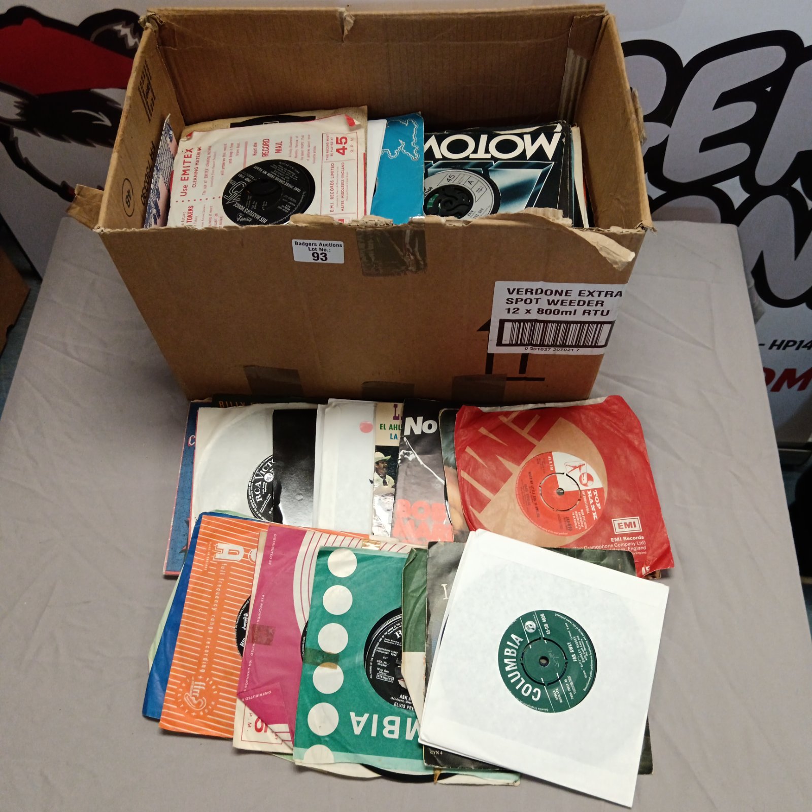 Collection of vintage 7" vinyl records including Cyndi Lauper single.