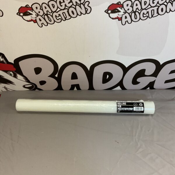 Vintage Vogue polyethylene rolling pin for baking and kitchen use.