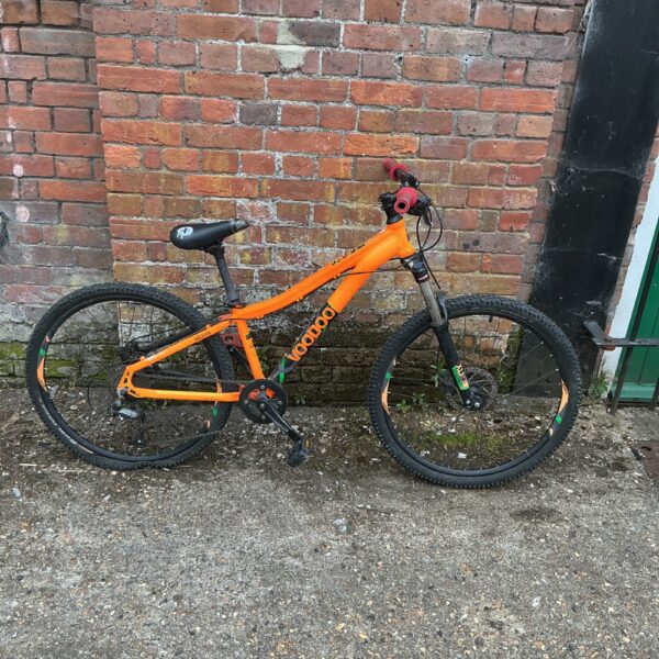 Orange Voodoo Nzumbi mountain bike for off-road cycling.
