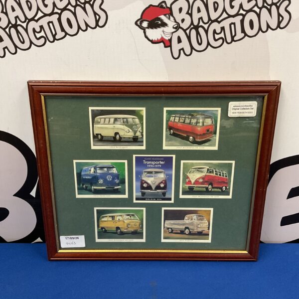 Framed set of vintage VW campervan cards, a collectible display.