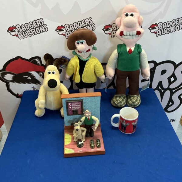 Wallace and Gromit figures and mug collection for fans.