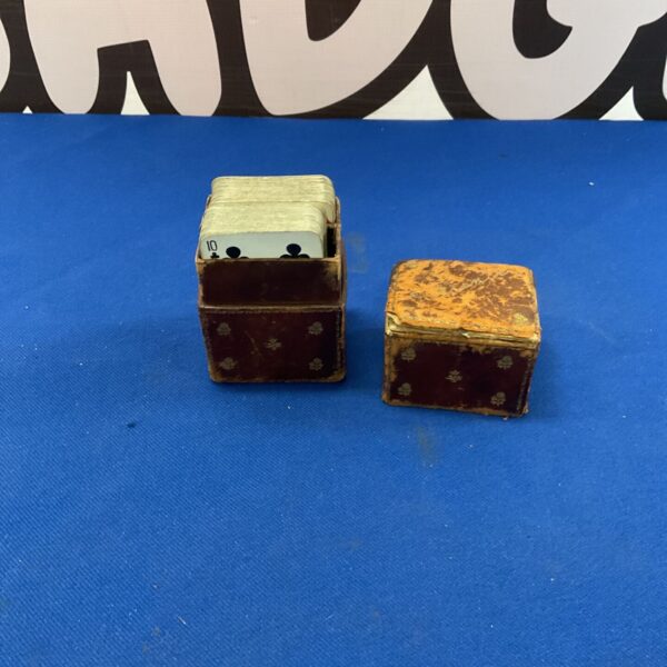 Vintage Walter Jones Patience card game with leather case and partial cards.