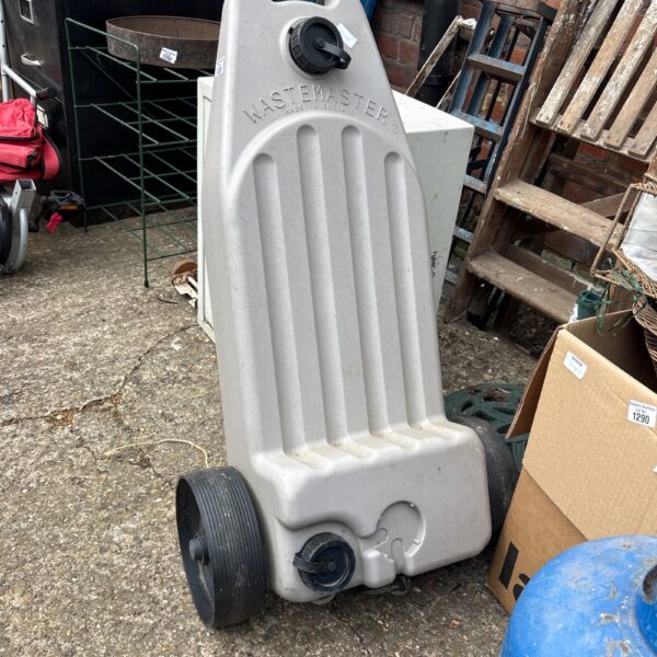 Blue Wastemaster wheeled water carrier with handle and wheel.