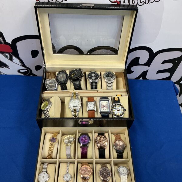 Watch display case with assorted vintage and modern watches.
