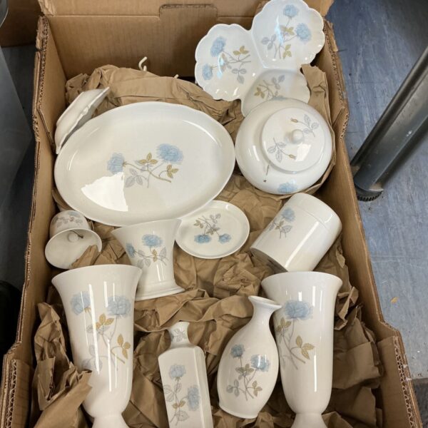 Wedgwood Ice Rose collection of vases and decorative items.