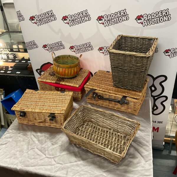 Assortment of rustic wicker baskets for storage and display.
