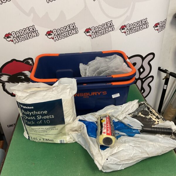 Wickes polythene dust sheets with painting rollers and sponges.