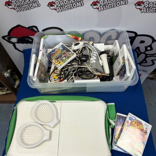 Wii balance board bundle with games and accessories.