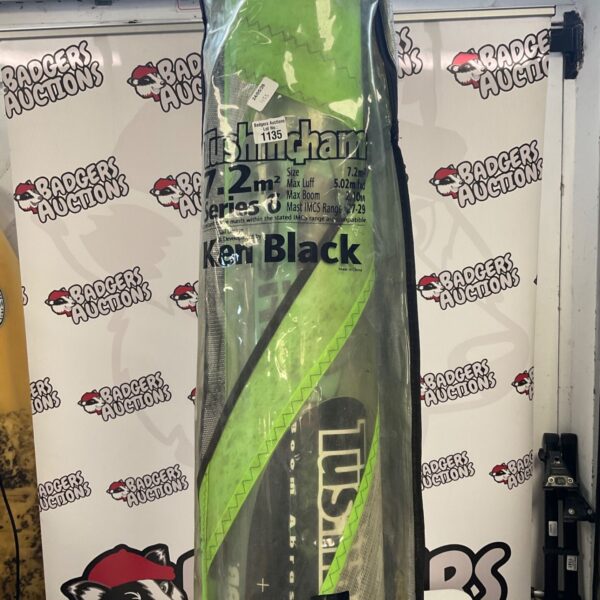 Vibrant 7.2m windsurf sail for sale, showing signs of use.