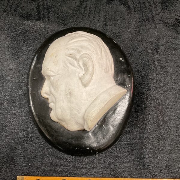 Vintage Winston Churchill plaster plaque, detailed relief portrait.