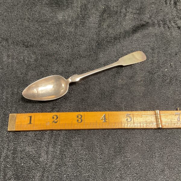 WWII German SS teaspoon with ruler for scale.