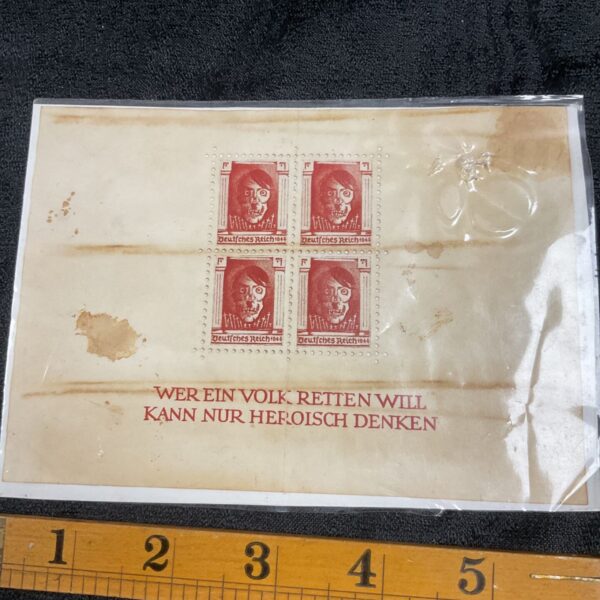 Rare WWII German resistance stamps depicting anti-Hitler symbolism.