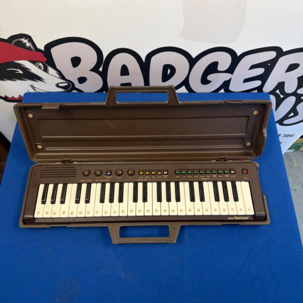 Vintage Yamaha PortaSound PS-3 keyboard with keys and controls.