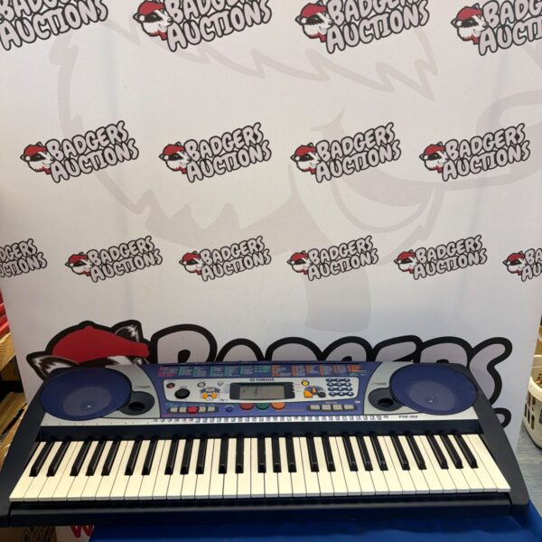 Yamaha PSR-260 electronic keyboard with keys and controls visible.