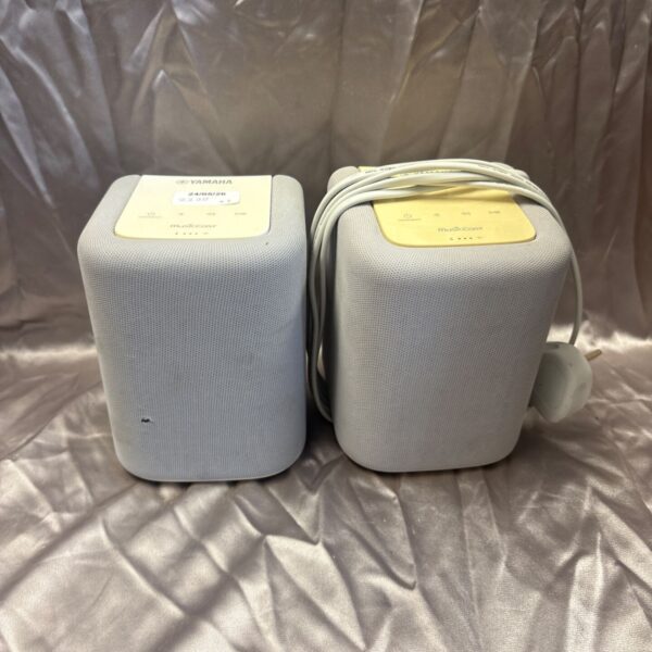 Pair of Yamaha WX-010 wireless speakers for home audio streaming.