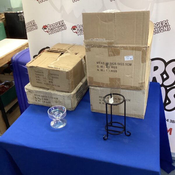 Four boxes of mixed Yankee Candle holders for home decor.
