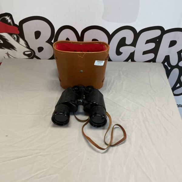 Vintage Zenith 10x50 binoculars with a leather case.