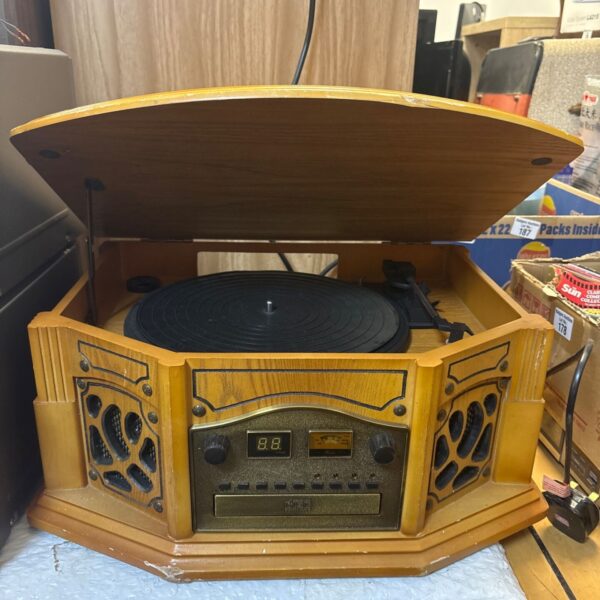 Zennox D3728 retro turntable radio in wooden cabinet.