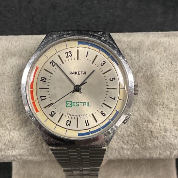 Vintage Zestail Paketa 24 hour mechanical wristwatch with steel bracelet.