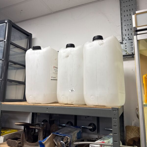 Lot of three empty 25L plastic barrels for storage.