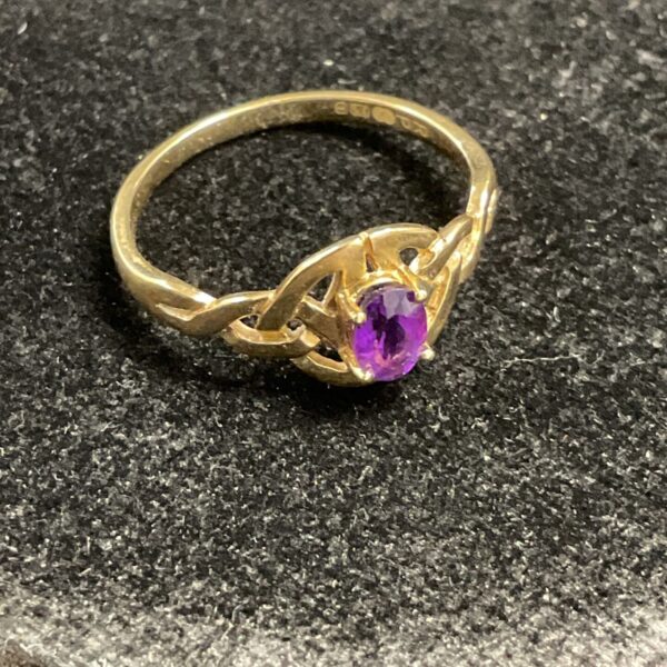 9ct gold amethyst Celtic ring with rose design.