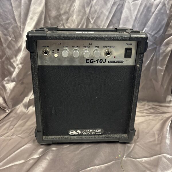 Acoustic Solutions EG-10J guitar amplifier with controls visible.