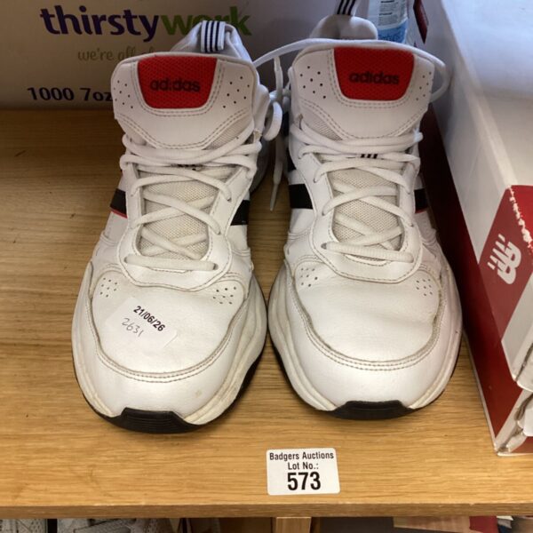 Adidas trainers size 9, showing wear and tear.