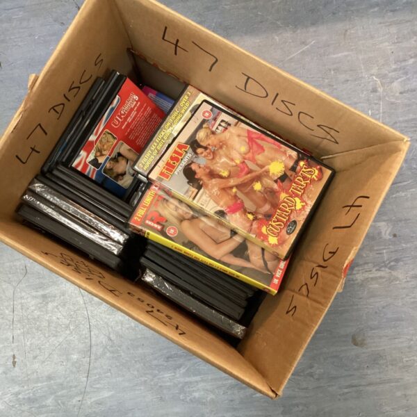 Box of adult DVDs for collectors and mature film enthusiasts.
