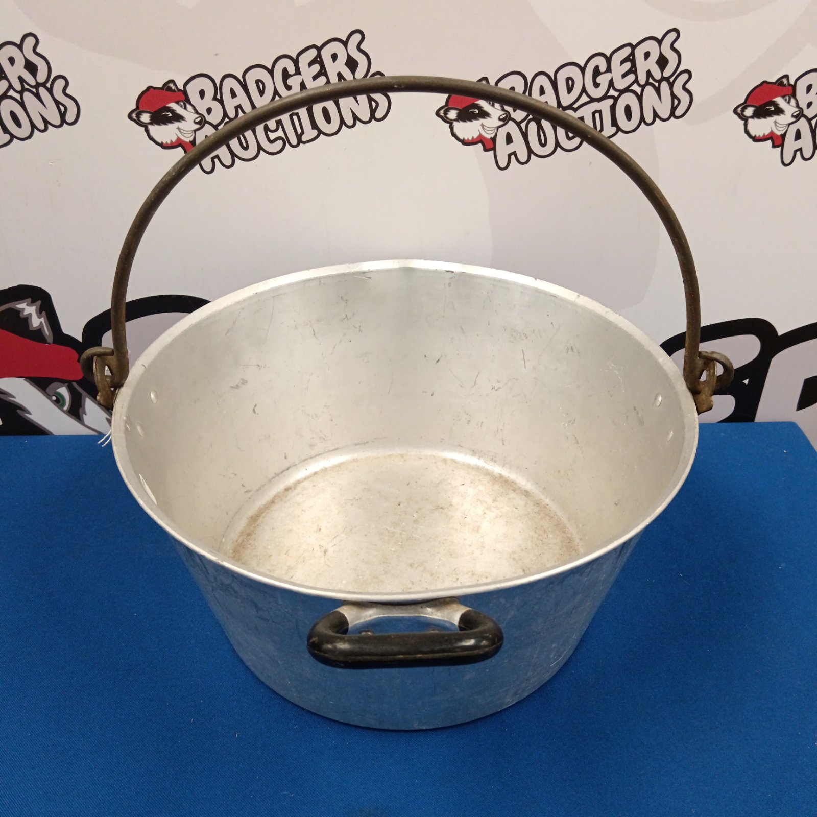 Large vintage aluminium jam pan with iron handle.