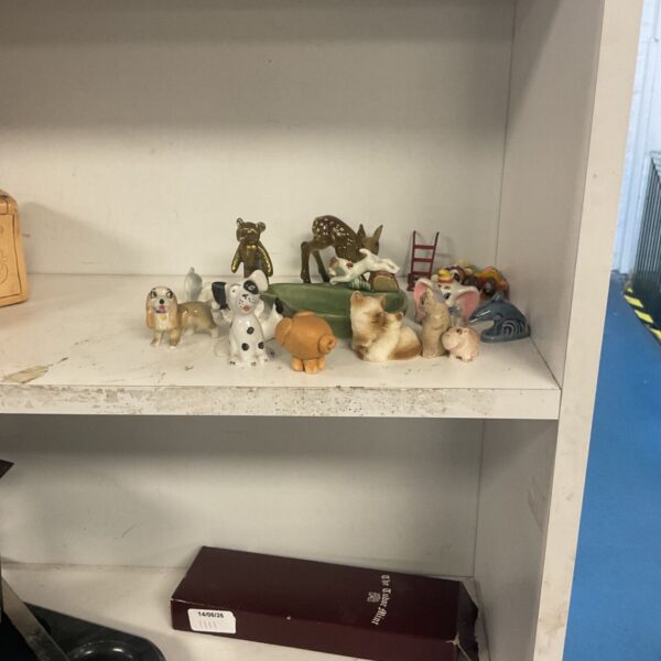 Collection of porcelain animal figurines for collectors.
