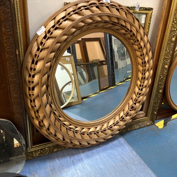 Braided rattan Anthropologie Tara wall mirror for boho home decor.